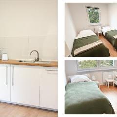 Monteurwohnungen mit TV, Internet, Parkplatz, Waschmaschine, Küche, Balkon, Restaurants und Supermarkt