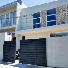 Villa kayu manis batu