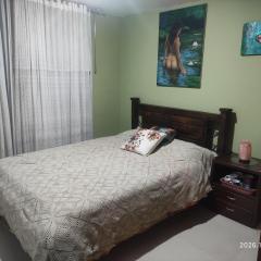 Habitacion cerca a SENDA DE CARNAVAL con cocina para desayuno