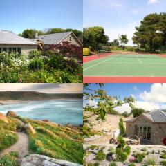 Putsborough Manor 3 Self Catering Cottages with Beach a short walk, dog friendly all year, On site Tennis, Play Area, Paddock, Spa baths, BBQ, Private Gardens, Superfast WIFI