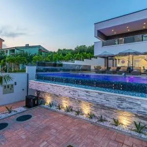 Luxury Villa Lorena with heated pool, jacuzzi,sauna and seaview