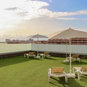 Ocean Garden suite 008 con jardín privado