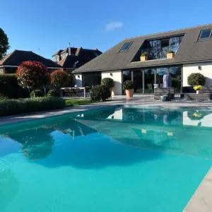 The Design House with Heated pool Sleeps 10
