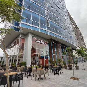 Distrito 90 - Estudios y Apartamentos para vacaciones y viajes de negocio