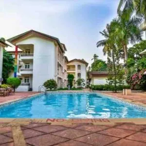 Comfortable 1BHK Apartment with pool Candolim by Casa Stay