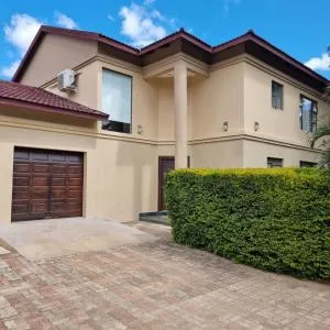 Beautiful 3 bedroom home in a gated complex with private garden and pool