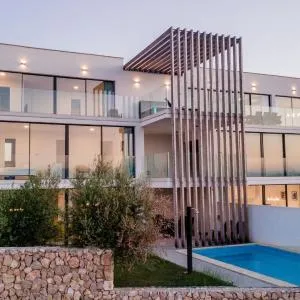 Deluxe Apartment Rova with private pool and sea view