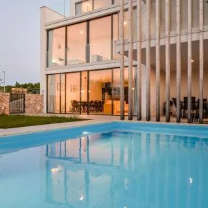 Deluxe Apartment Rova with private pool and sea view