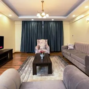 K's Place - Elegant 2 Bedroom Apartment with a Pool & Gym