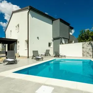 Family friendly apartments with a swimming pool Soline, Krk - 9715