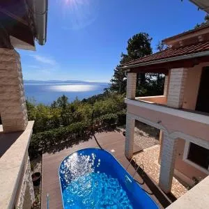 Hidden forest villa with sweeping views