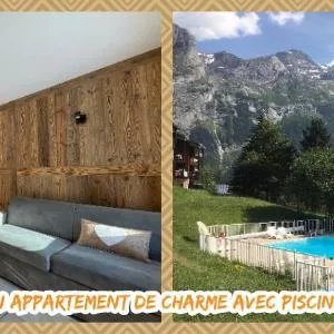 Le Bouquetin 73 Appartement cosy type chalet avec piscine au pied des pistes et superbe vue panoramique