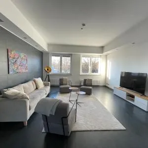 TruRetreats Design Loft für 8 Personen I Riesige Küche I eCharger I 65z SmartTV I 150qm