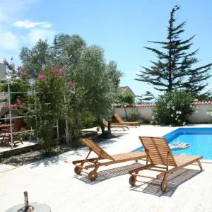 Three-Bedroom Apartment with Pool and Garden