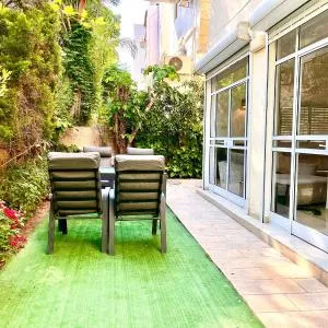 Amazing 3-room garden apartment near Gordon Beach and the Hilton