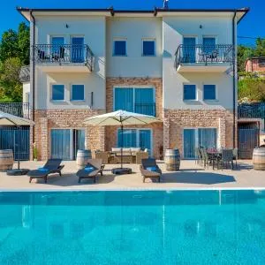 Villa Esarjo with Heated Pool and Sea View