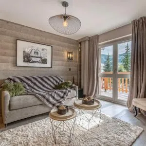 Superbe Appartement au Plateau Rond-Point des Pistes Classé 3 Etoiles et Label Méribel