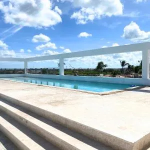 CARAIBICO SUITES Rooftop Pool & Beach Club