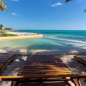 Angelina 28 Beachfront and Family Apartments - Modern and Relaxing Long Stays - 20 min from Cancun Airport