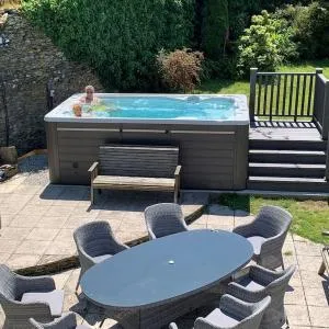 Superb Old Farmhouse near the Beach with Large Hot Tub , Free Access to an Indoor Pool, Free Animal Feeding ,Free Pony Rides and Free Tractor Rides