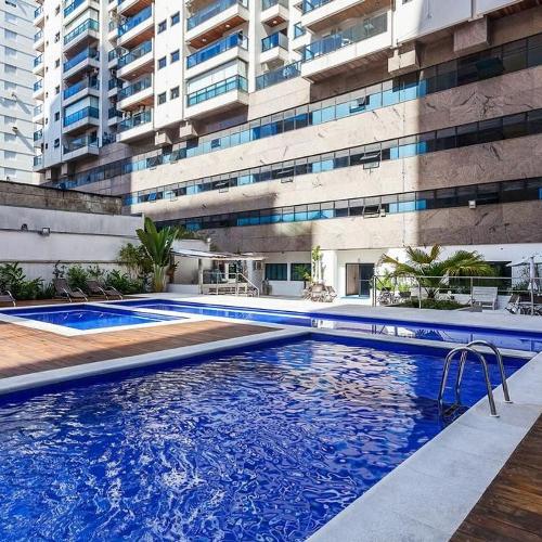 Flats Capitania Varam Pitangueiras em Guarujá, SP - pousada e hospedagem