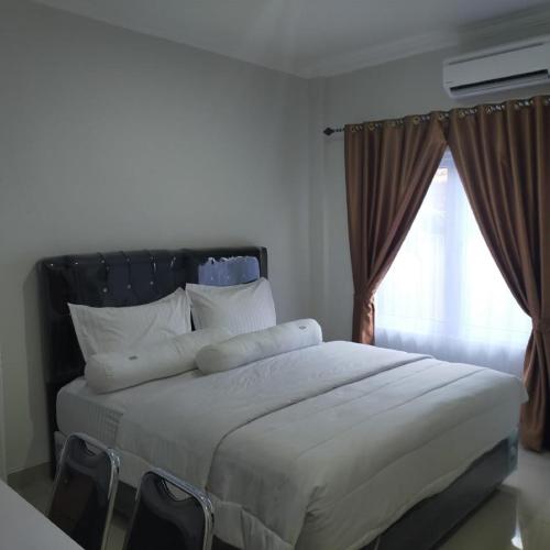 Image of RedDoorz near Palembang Airport 2