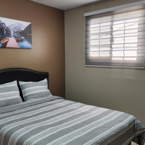 Image of The Layover - Modern 2BR 6 mins from the Airport Ideal for Short