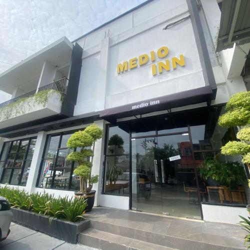 Image of Urbanview Hotel Medio Inn Palu by RedDoorz