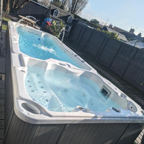 Image of 3 bed home, pool-hot tub & ev charger