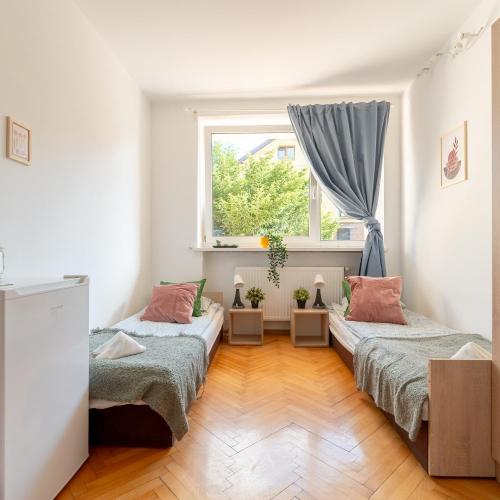 Image of Hostello Airport - Przytulne pokoje, ogr�d, grill, w pe?ni wypos