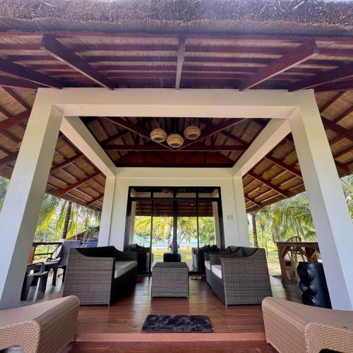Image of Tropical Palms Villa and Beachfront Resort