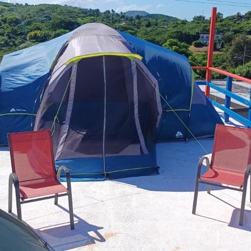 Image of Rooster Run Glamping Camping has rooftop and off the ground Glam