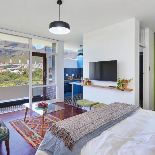 Chic City Studio Apartment with Mountain Views