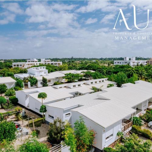 Apartments & Villas Fumba Town by Aura Space