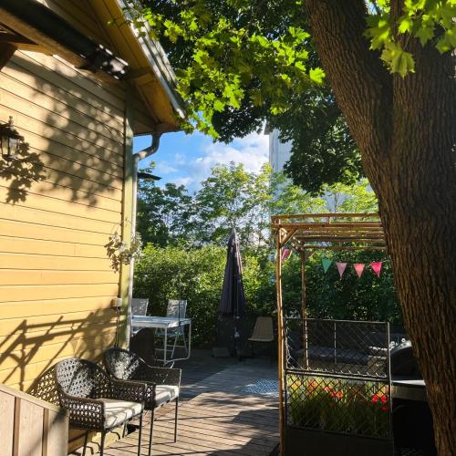 Image of The dream of a wooden house with its own yard and a wood-fired s