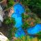 Grand Tropic Suites Hotel