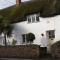 Tudor Thatch Cottage