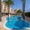 Hotel Illot Suites
