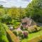 Enchanting 16th century thatched cottage in large private park - The Gildhall