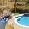 Comfortable Two Bedroom Apartment with Communal Pool, Aircon and Free WiFi