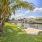 Bright Canalfront Home with Boat Dock, Patio, Grill!