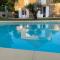 Amity. Exclusive poolside garden apartment