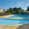 Maison mitoyenne , piscine,Citerne, jardin, parking, plage