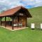 Wooden hut at tourist farm Artisek