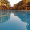 British Resort pool view Apartments