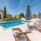 Apartment Villa 2 Pools-1 by Interhome