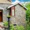 A small studio of a nature stone house