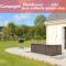 Maison confortable séjour spacieux, belle terrasse avec grand jardin avec jeux extérieurs près Bayeux et Omaha Beach