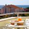 The Florens Residence near the beach with the pool, BBQ and kids playground, Zadar Diklo