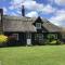 Thatched Cottage in a rural setting with Hot Tub